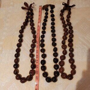 Blue Ruby Chestnut necklace natural brown colors, ~17" long, bow tie at neck